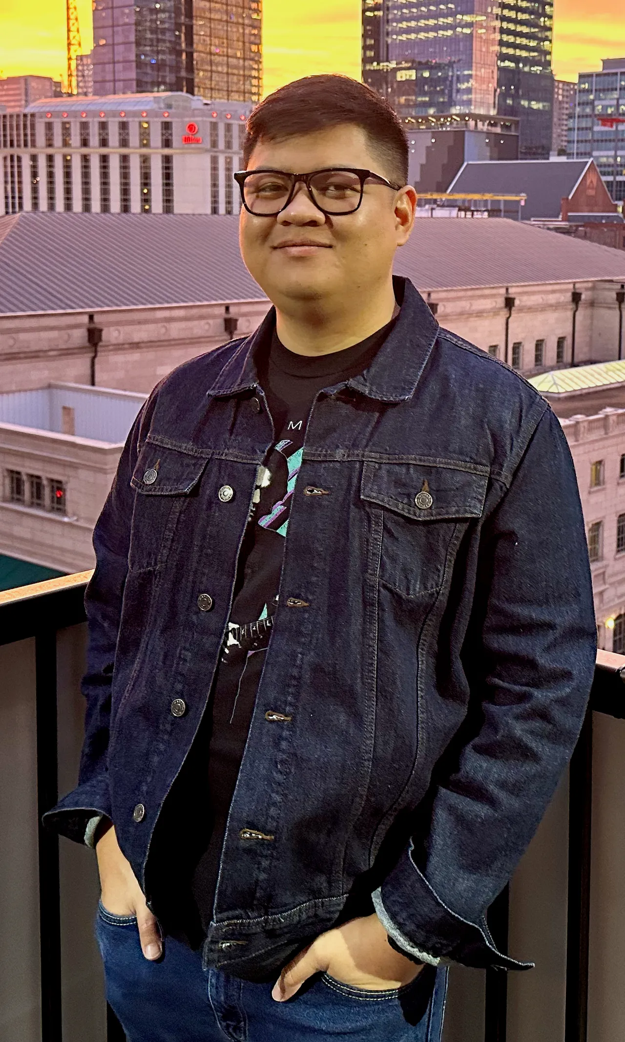 Carlo Bruno, founder of King's Forge Studio, standing at a city overlook.